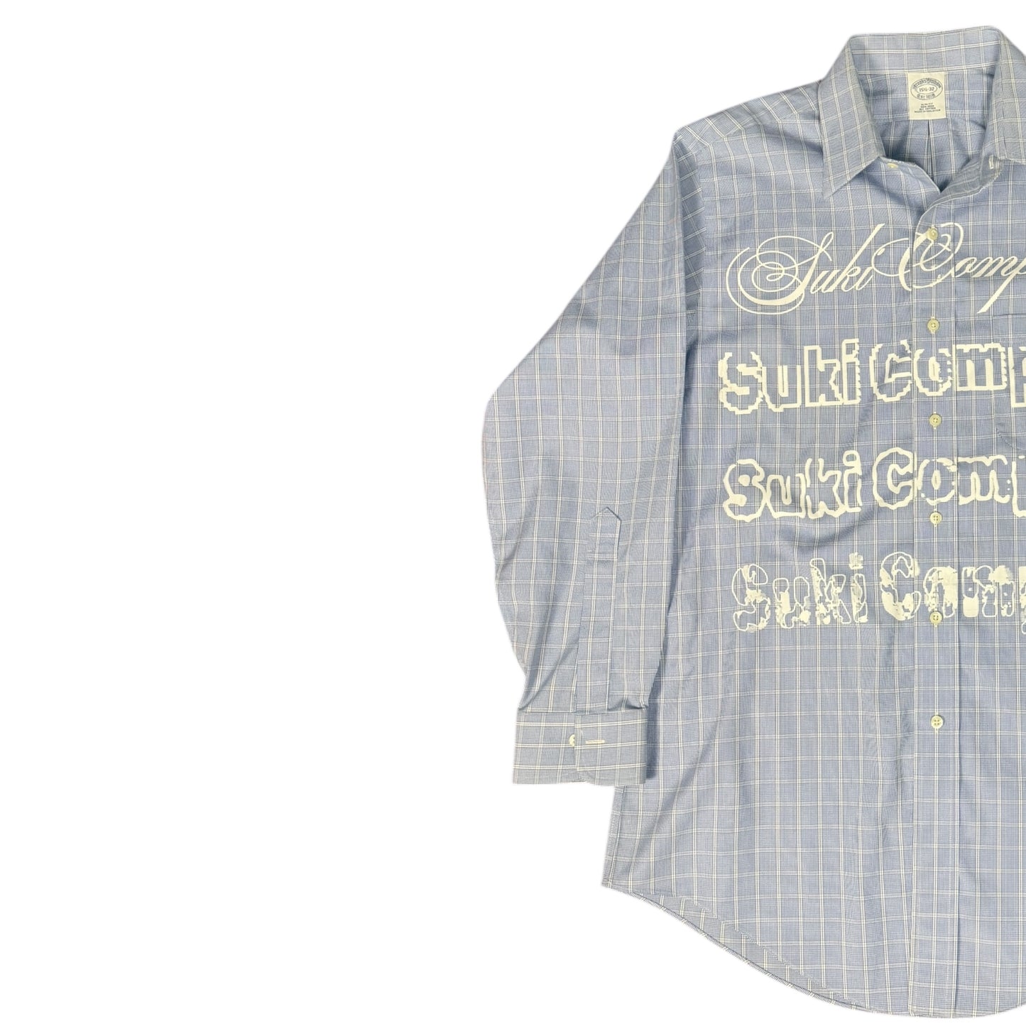 CAMISA MANGA LARGA SUKI AZUL CLARO CUADROS LETRAS BLANCAS TALLA L SK217