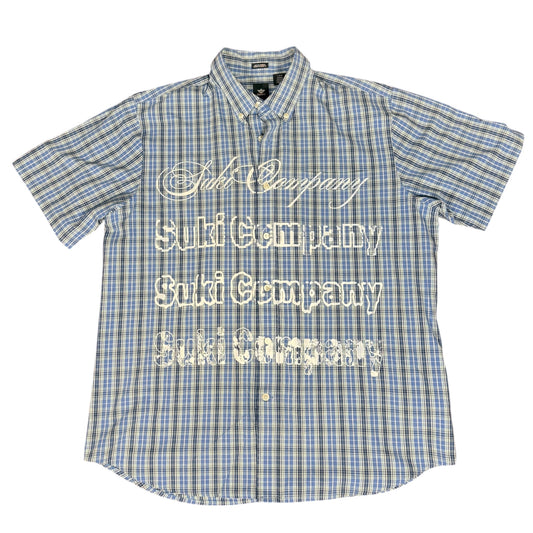 CAMISA MANGA CORTA SUKI AZUL CUADROS LETRAS BLANCAS TALLA L SK221