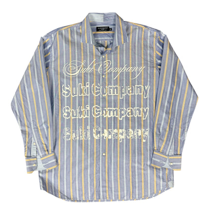 CAMISA MANGA LARGA SUKI AZUL RAYAS AMARILLAS LETRAS BLANCAS TALLA L SK214
