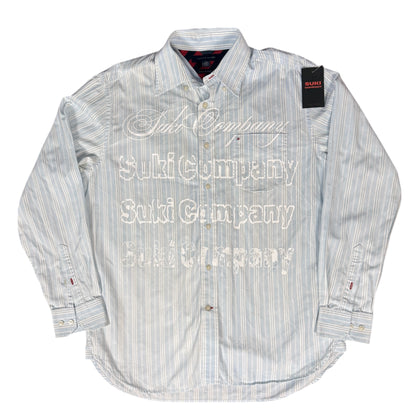 CAMISA MANGA LARGA SUKI AZUL CLARO RAYAS LETRAS BLANCAS TALLA L SK206