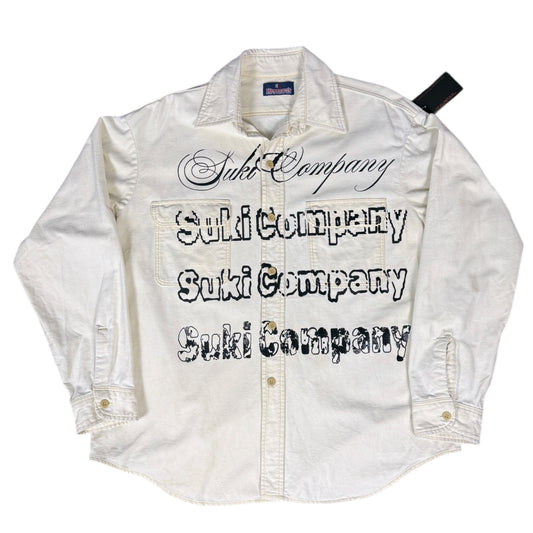 CAMISA MANGA LARGA SUKI CREMA LISA LETRAS NEGRAS TALLA M SK213